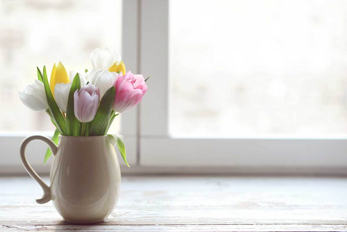 Colorful-bouquet-of-tulips-on-a-jar-vase