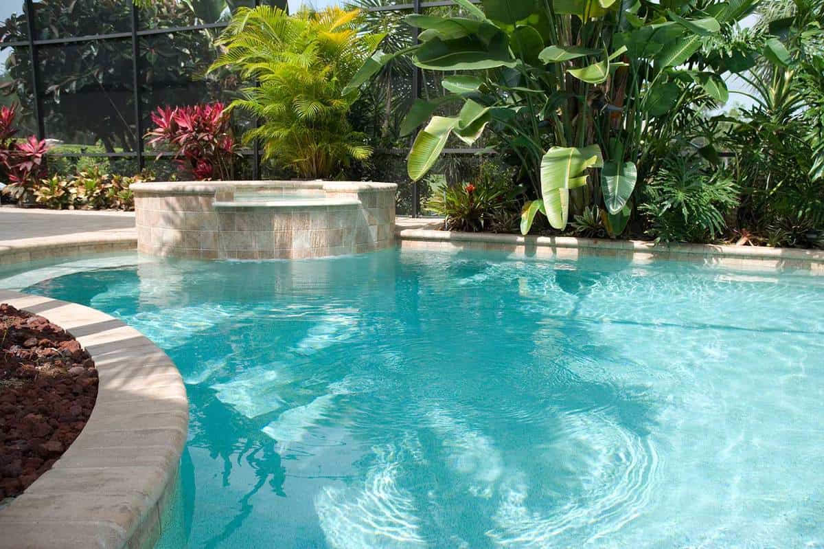 Swimming pool with hot tub
