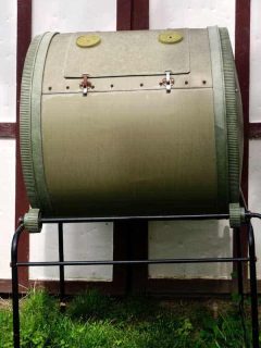 Composter placed next to garden shed, Where To Buy A Composter [Top 40 online stores]