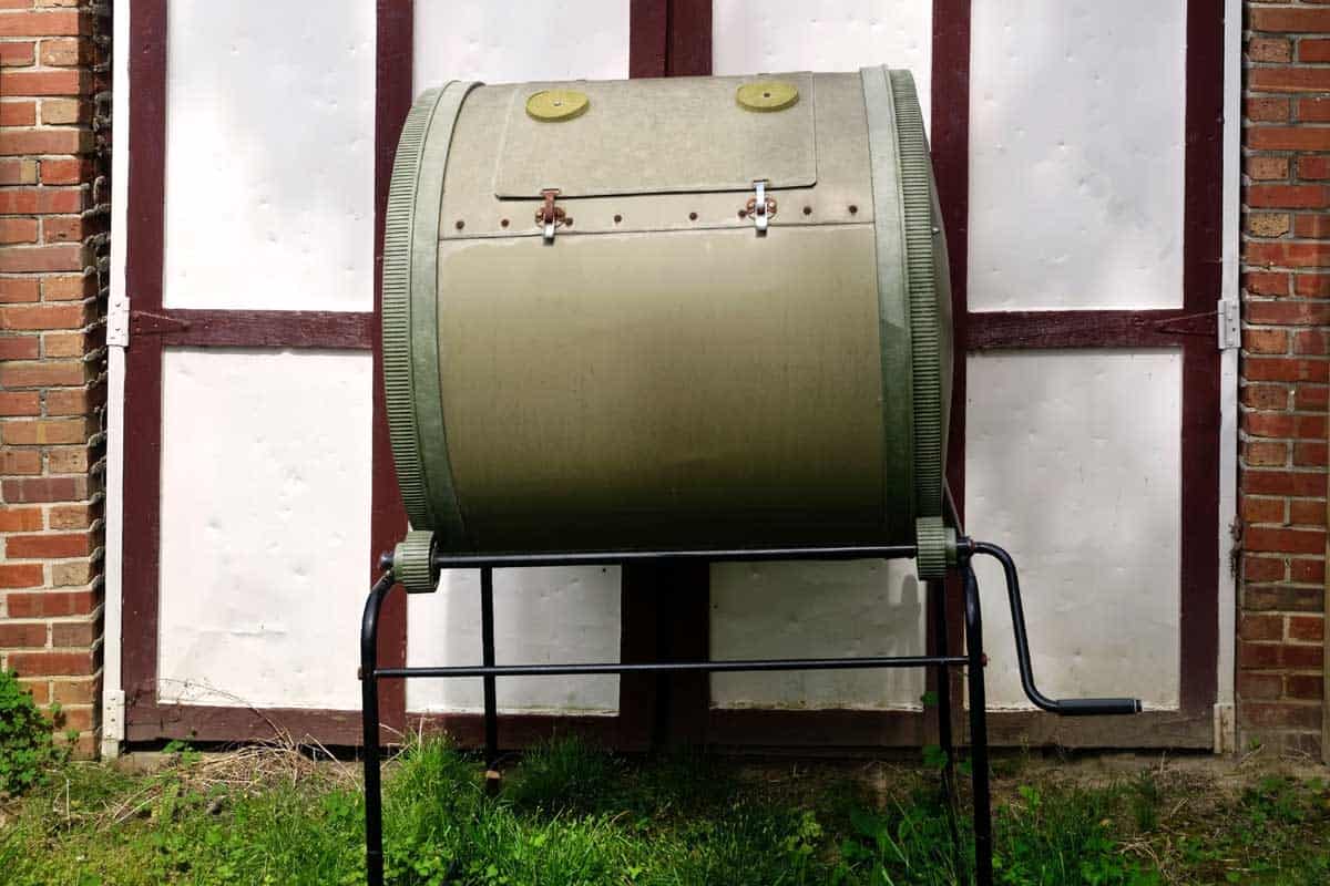 Composter placed next to garden shed, Where To Buy A Composter [Top 40 online stores]