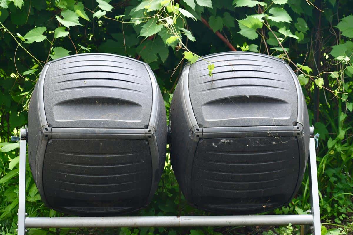 Double tumbling compost bins in the backyard, 6 Best Compost Starters For Your Tumbler