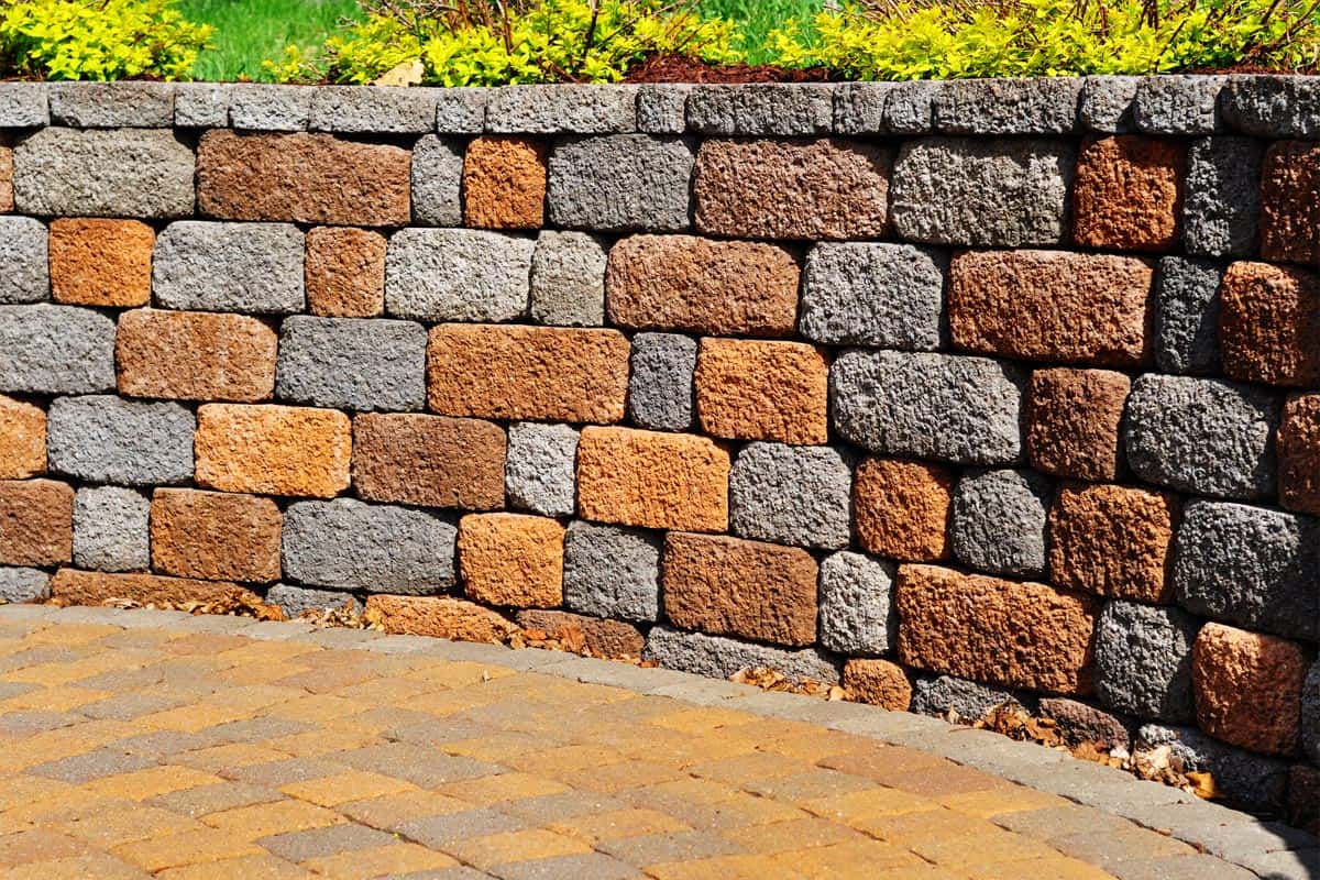 A retaining wall and patio on the garden, Should A Retaining Wall Be Level?
