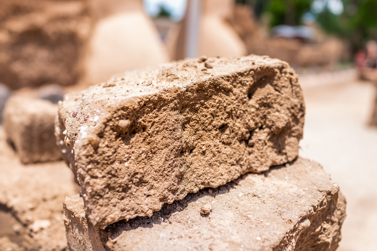 Closeup of adobe mud sun dried brick showing detail and texture during construction