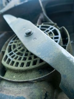 Lawn mower blade in close up shot, What Angle to Sharpen Lawn Mower Blades