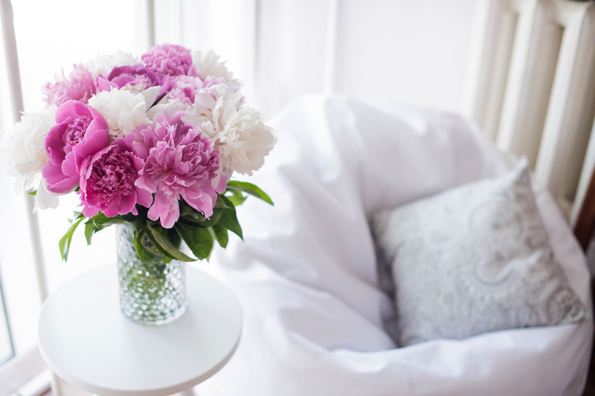 home decoration, fresh pink peonies on coffee table