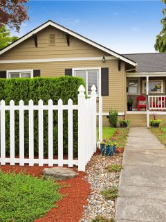American house exterior with white wooden fence - How To Fill The Gap Between A Fence Post And House