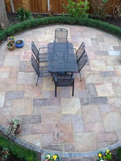 Circular Garden patio with table and chairs, Water Pooling On Patio Pavers - What To Do?