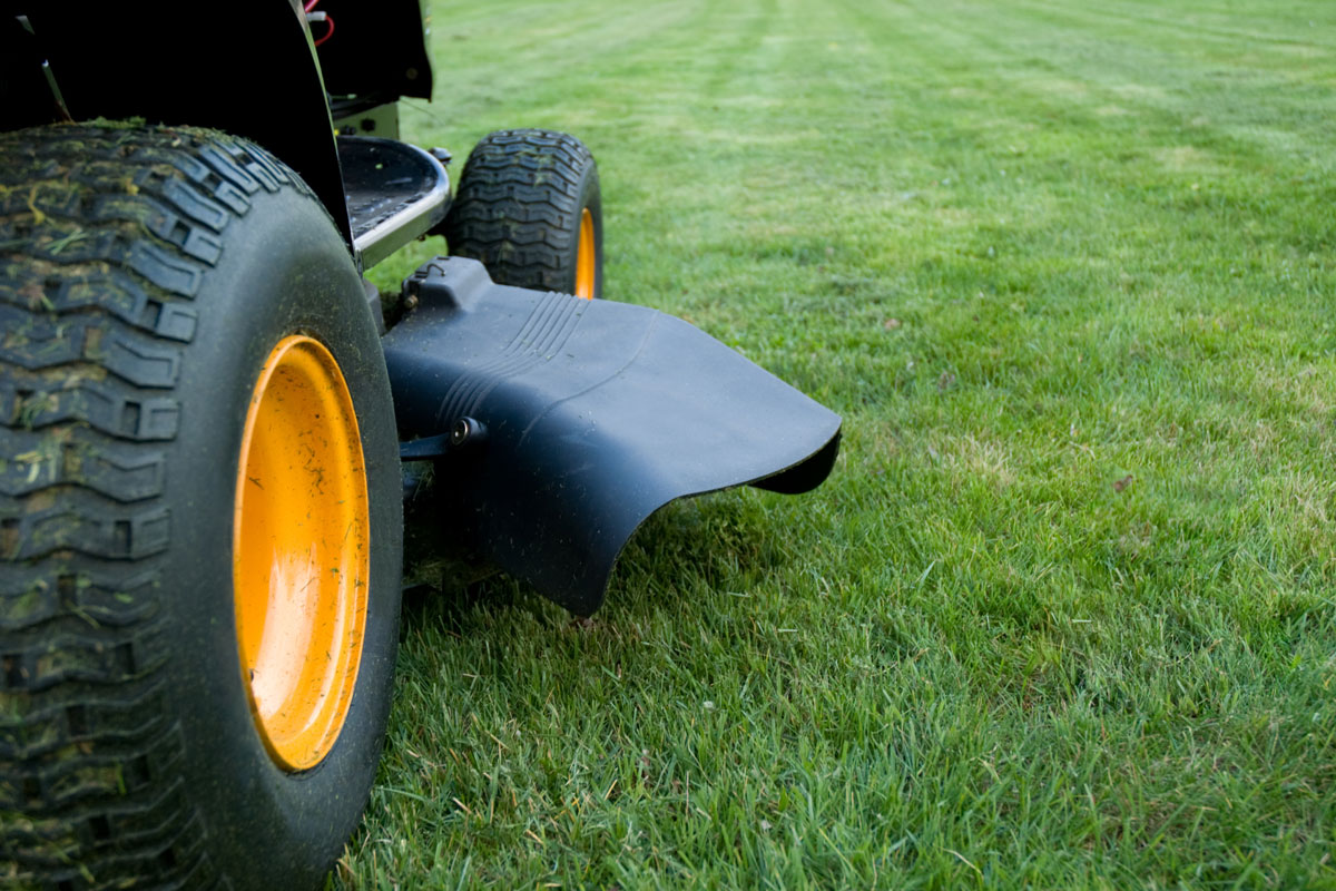 Ground level closeup of a ride on mower