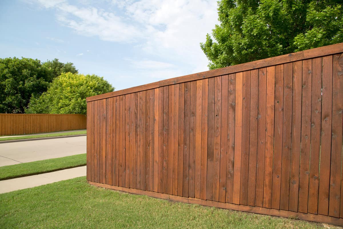 Nice wooden fence around house