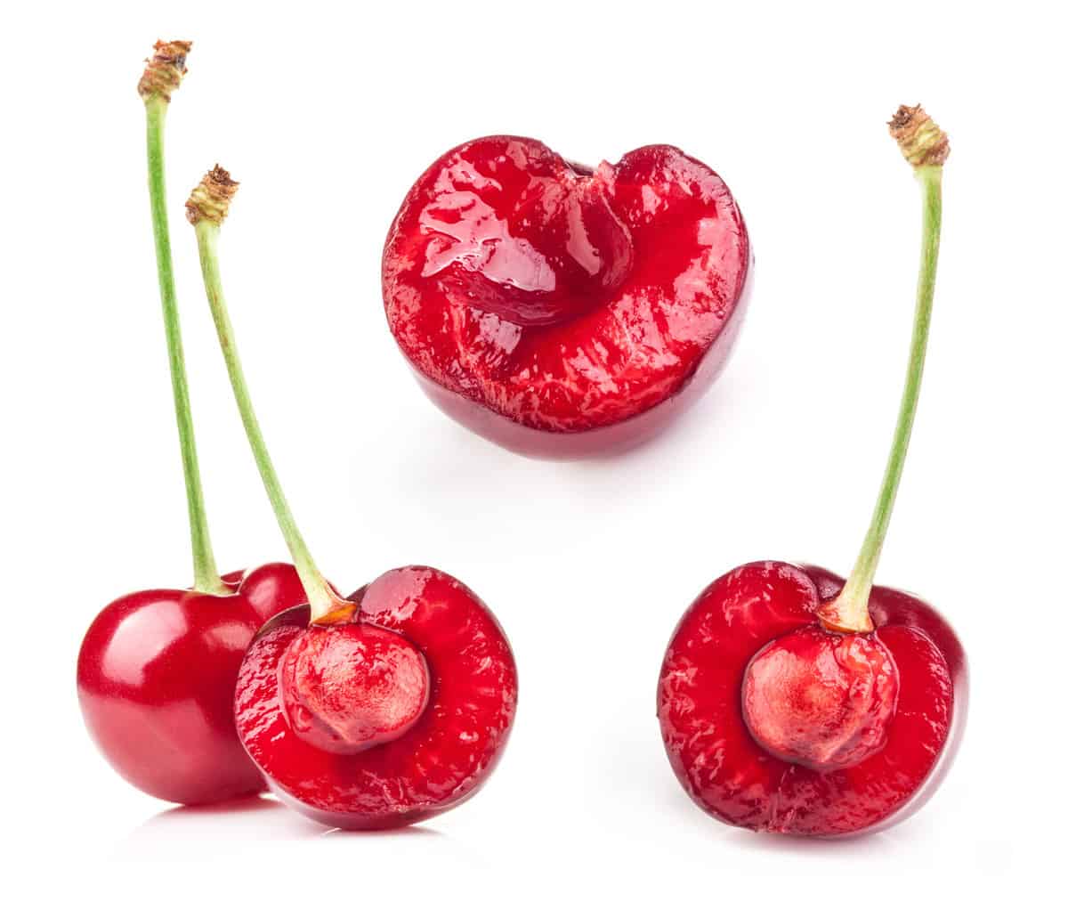 Half of cherry isolated on white