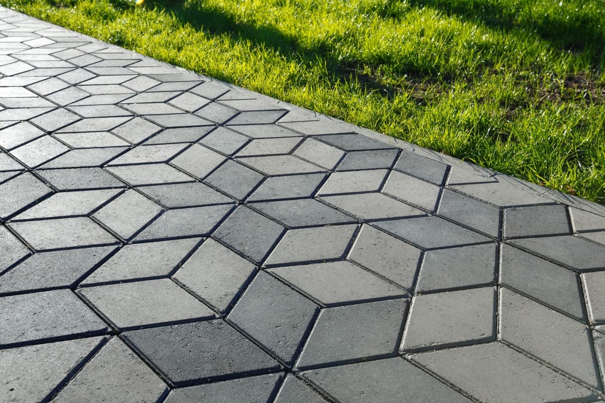 Shapes and Patterns - The footpath in the park is paved with diamond shaped concrete tiles.