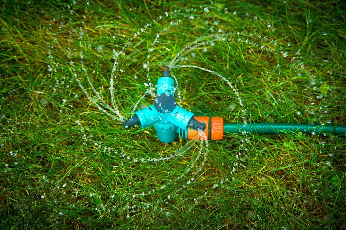 Sprinkler equipment for spraying grass early in the morning in hot weather