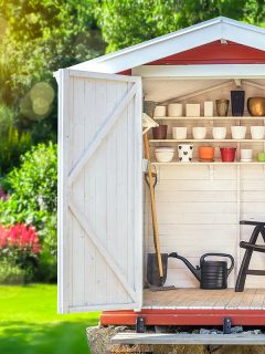 Garden shed filled with gardening tools, How To Fill A Gap Under Your Shed?