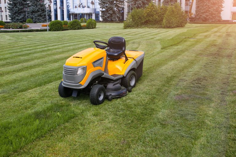 Grass cutter in the work. Machine for cutting lawn is standing outdoors., How Can I Make My Cub Cadet Faster?