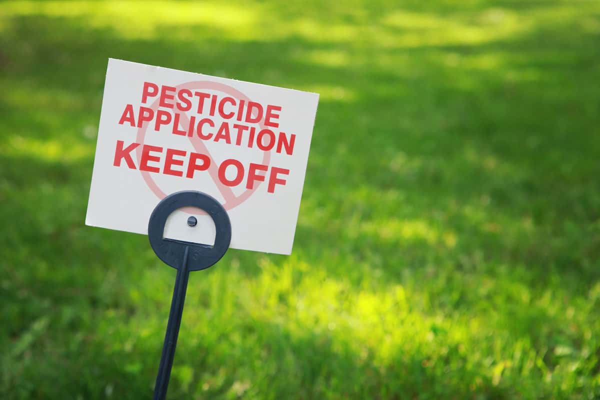 Pesticide applicaton sign with treated grass