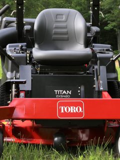 A Toro Titan lawn mower in the yard, What Year Is My Toro Mower?