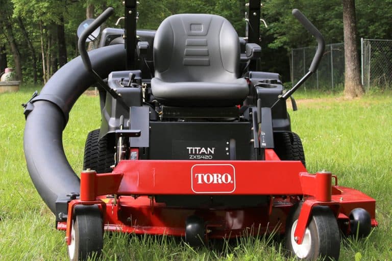 A Toro Titan lawn mower in the yard, What Year Is My Toro Mower?