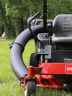 Toro Titan lawn mower in the yard, Toro Lawn Mower Smoking - Why And What To Do?