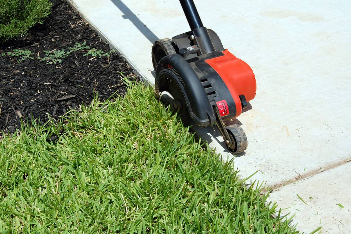 Yard Edger in Action on the garden lawn