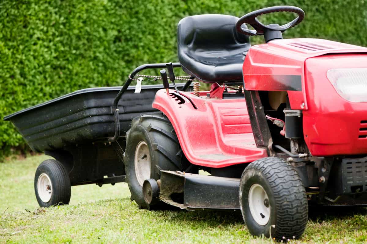 a red tractor mower