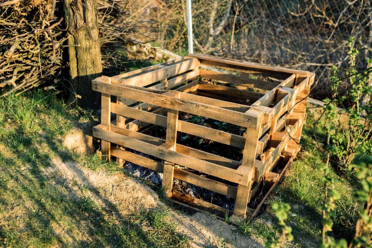 Composter made of pallets in garden