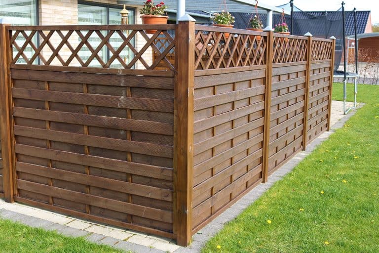 A terrace wooden fence with privacy lattice screen, How To Build A Freestanding Privacy Screen [Step By Step Guide]