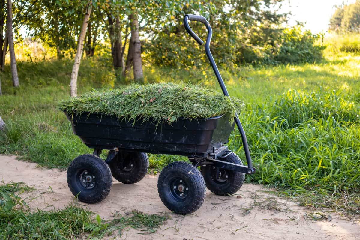 garden cart on four wheels cut grass easy to use