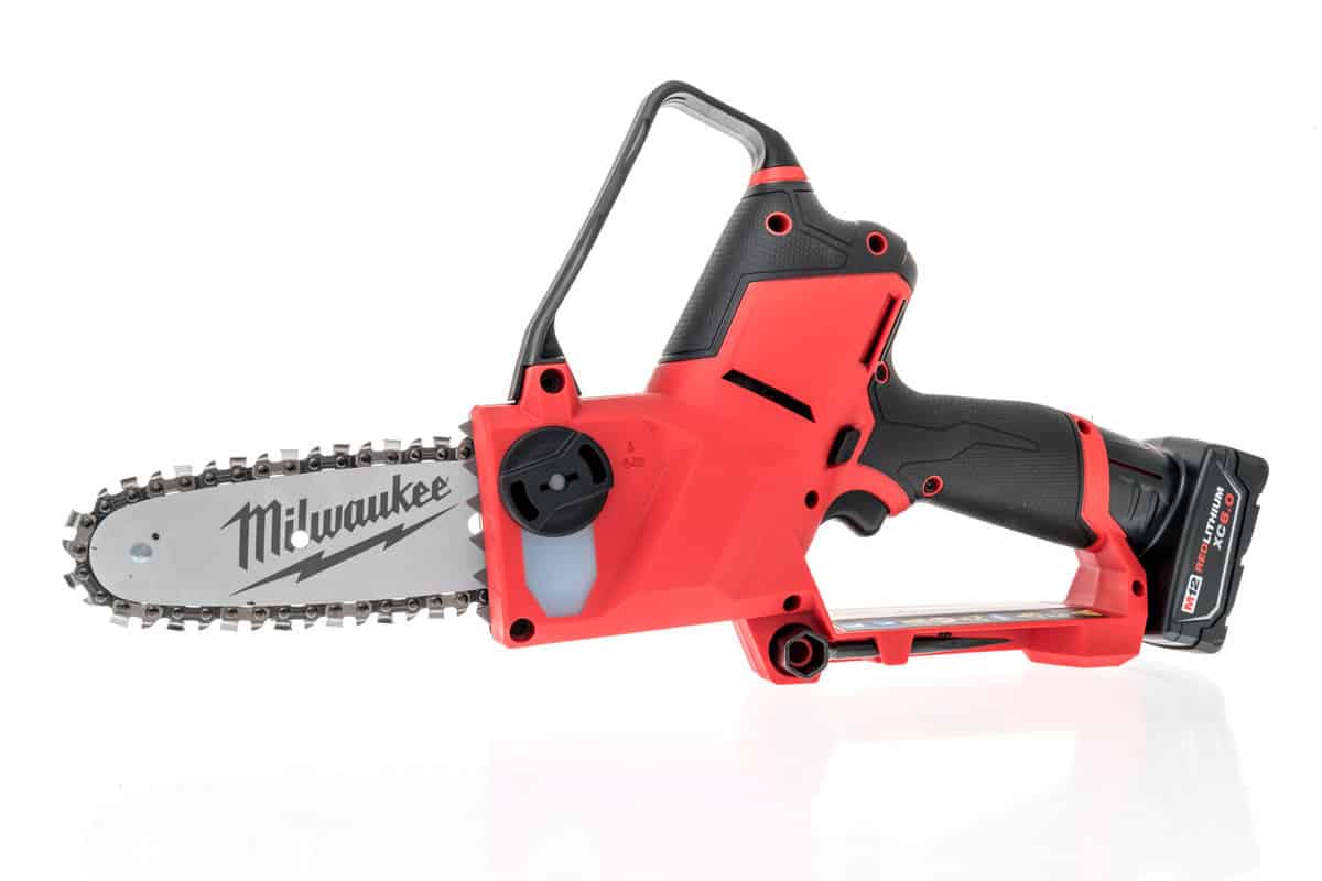 A package of Milwaukee hatchet chainsaw battery m12 on an isolated background
