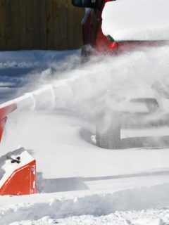 Operating a snow blower to clear thick snow at the driveway, How To Start A Cub Cadet Snow Blower