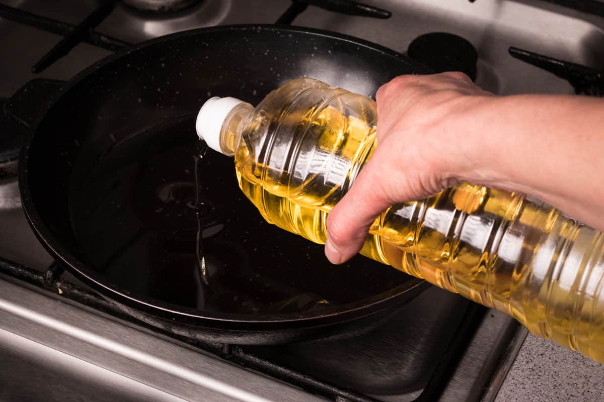 Pouring vegetable oil on a pan