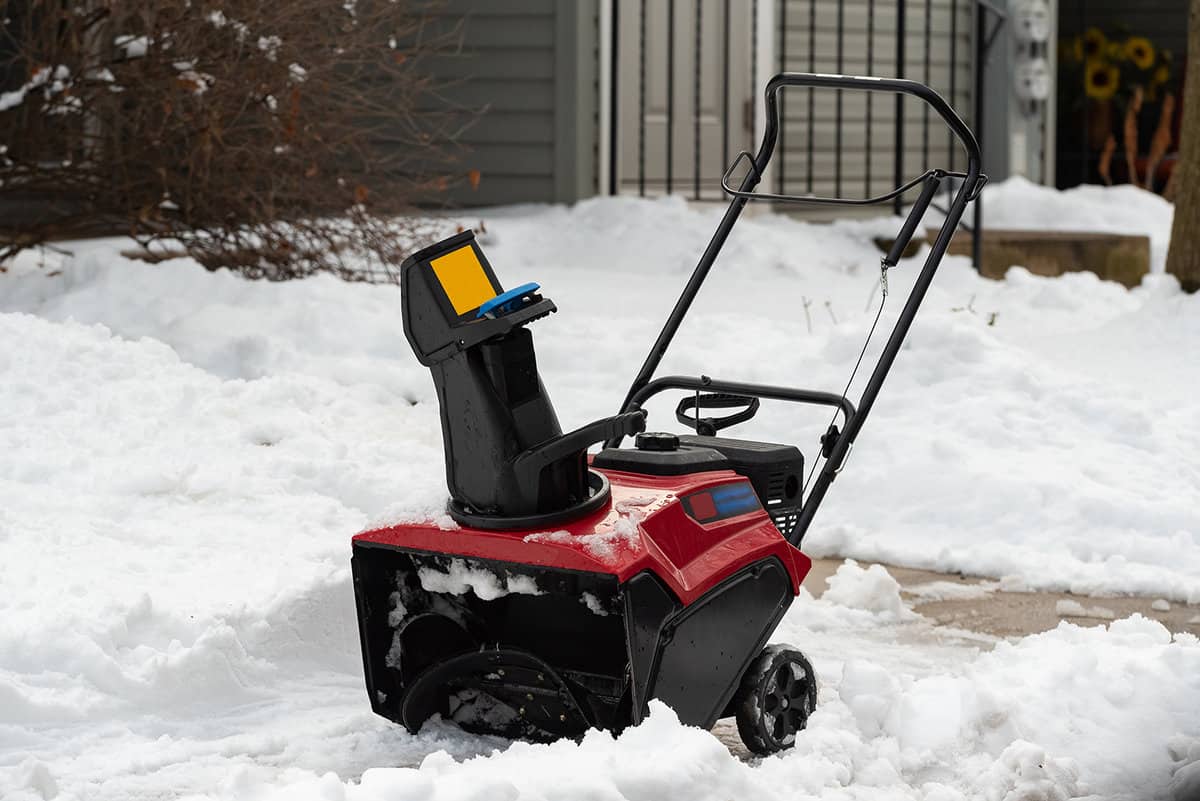 Red snow blowers in winter cold storm compact
