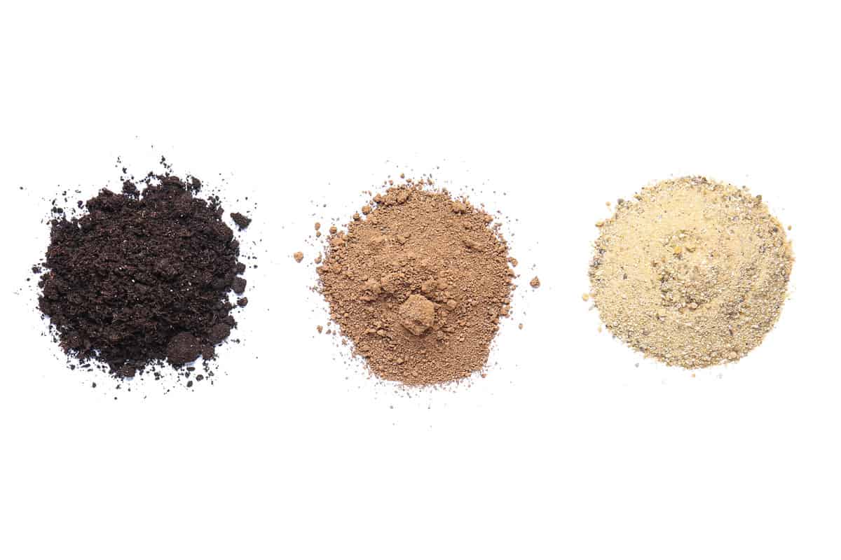 different types soil on white background