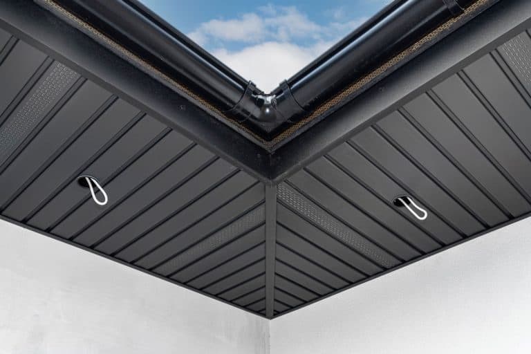 A modern graphite herringbone roof lining is attached in the soffit, Can You Hang Plants From Soffit?