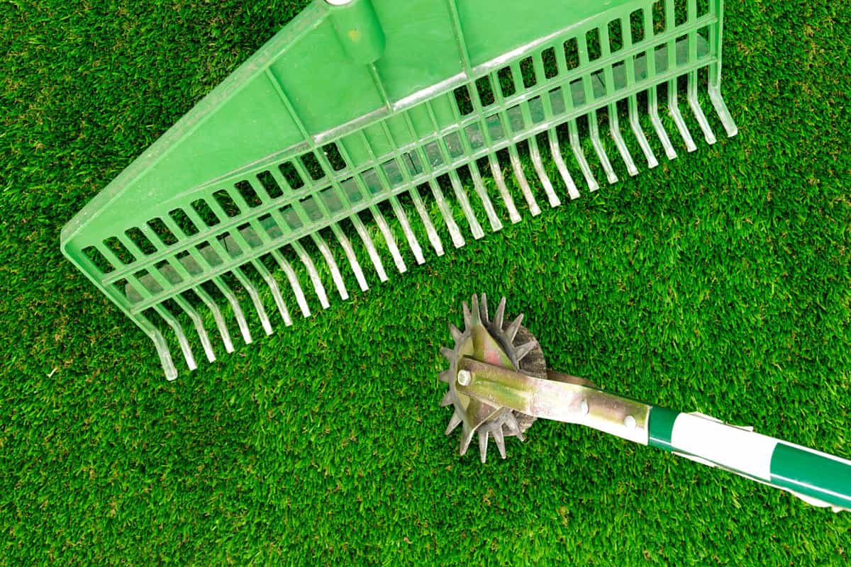 A studio photo of a garden equipment of artificial turf

