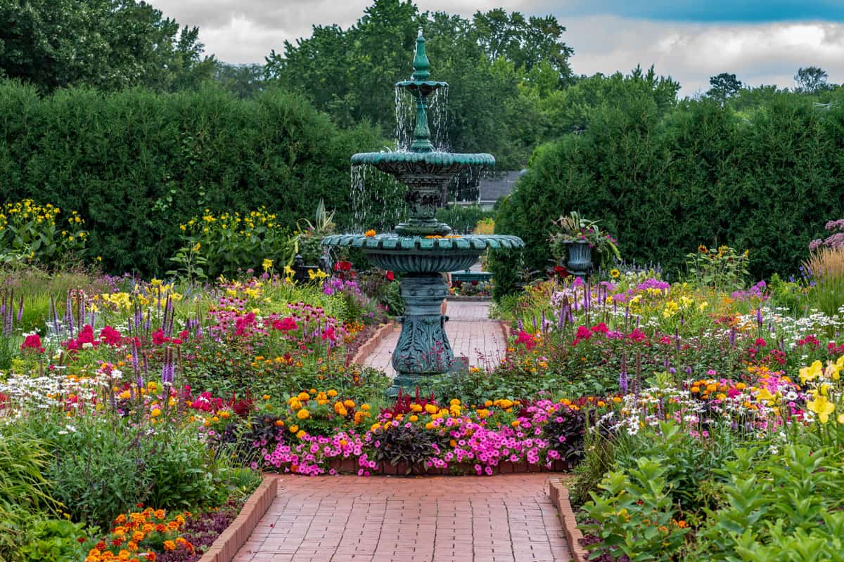 Beautiful flowers surrounding the fountain