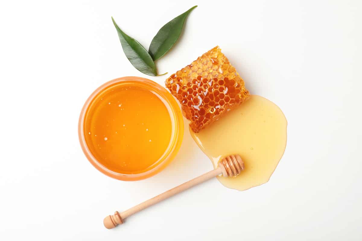 Composition with fresh honey