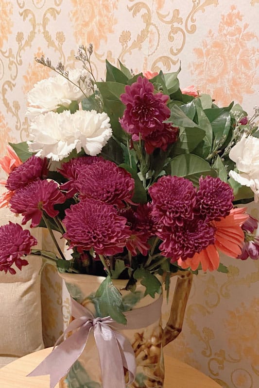 Deep red Chrysanthemums with white flowers