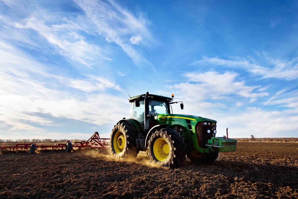 Ploughing a field with John Deere 6930 tractor