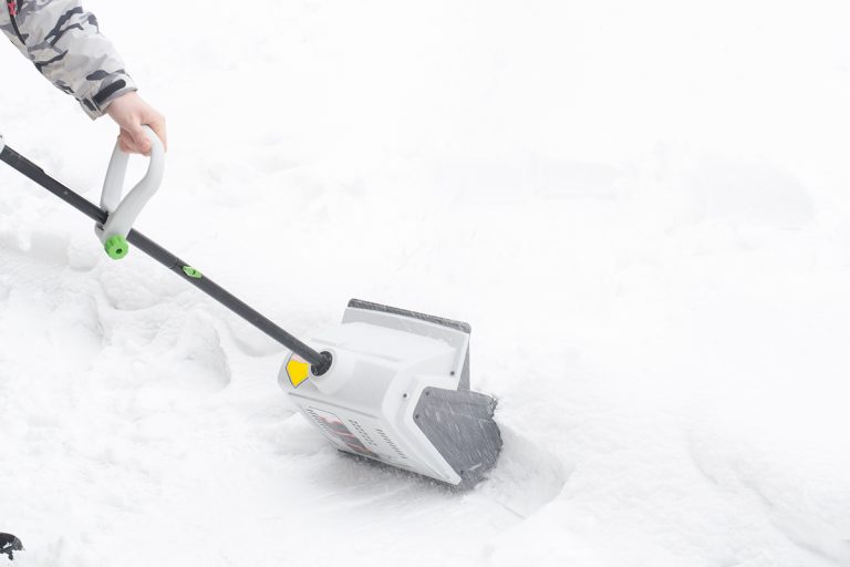 Removing snow using snow removal device, How To Remove The Battery From A Snow Joe Shovel