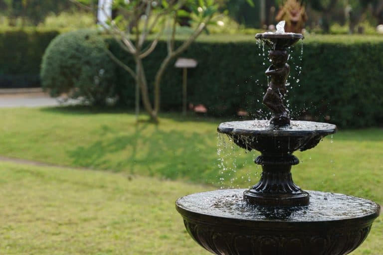 Stone fountain photographed in a huge gorgeous garden, Do Garden Fountains Need Electricity?