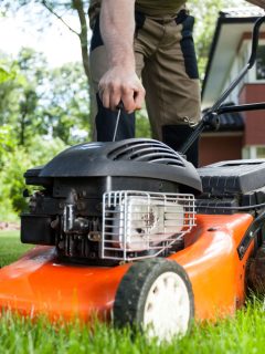 Turning on the lawn mower by gardener, What Causes A Blown Head Gasket On A Lawn Mower [With Tips On Repair]