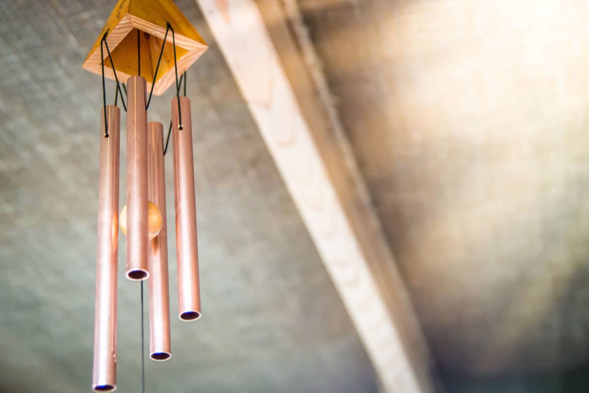 a wind chime under the roof of the restaurant in Thailand 