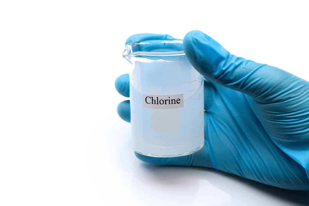 chlorine solution in glass, Chlorine is used to kill bacteria or to perform experiment in laboratory 