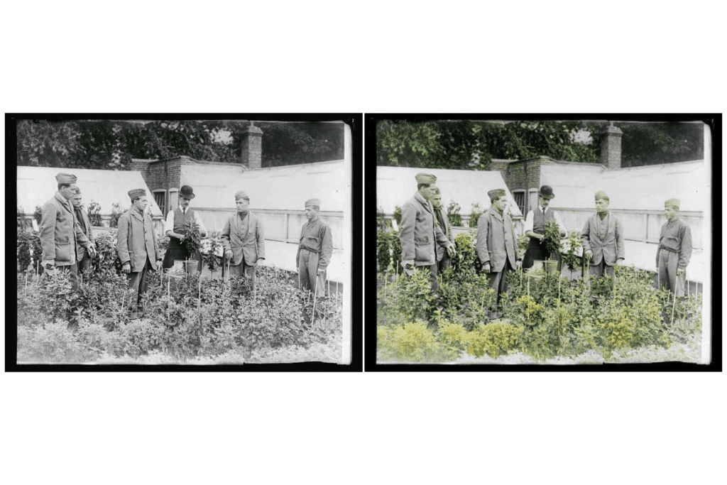 A landowner along with his gardeners black and white photo 