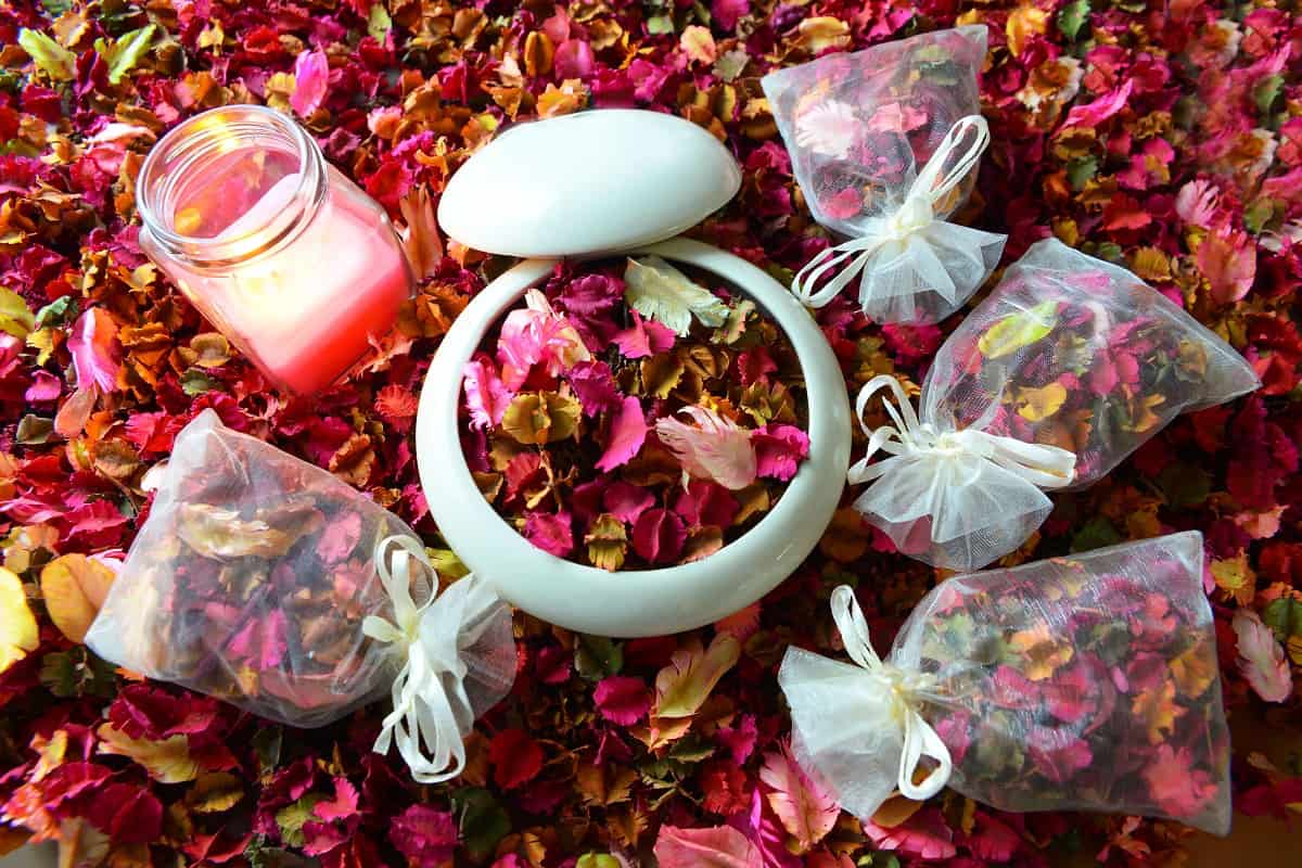 Potpourri or dried petals flowers colorful and scented candles