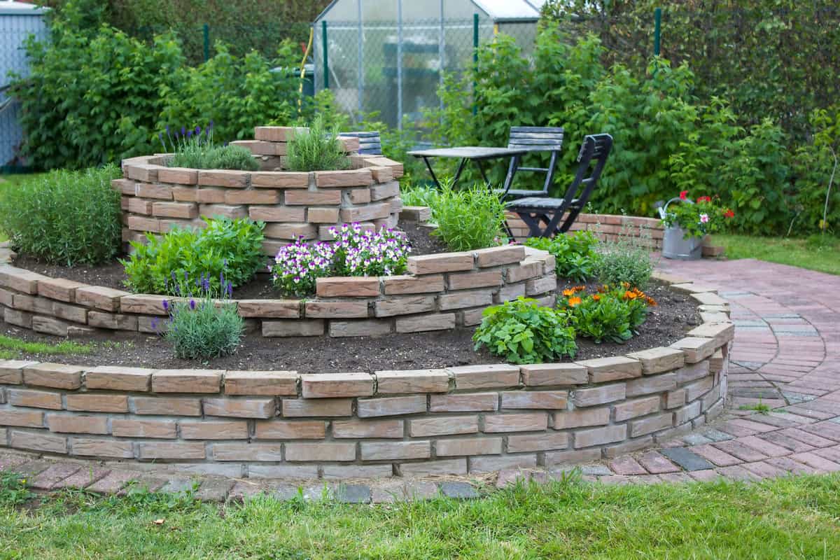 A gorgeous Herb spiral garden made from bricks