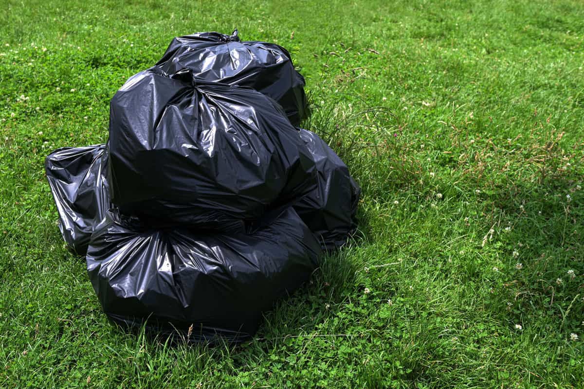 Trash bags filled with grass cuttings