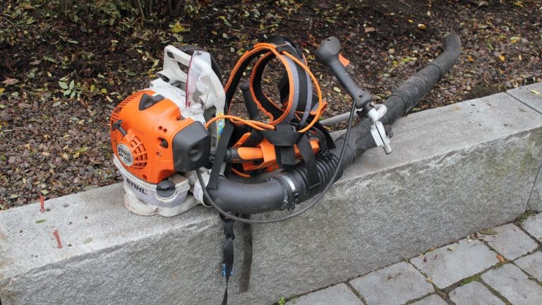 A Stihl leaf blower placed on the side of the street, How Much Is A STIHL Leaf Blower? - 1600x900