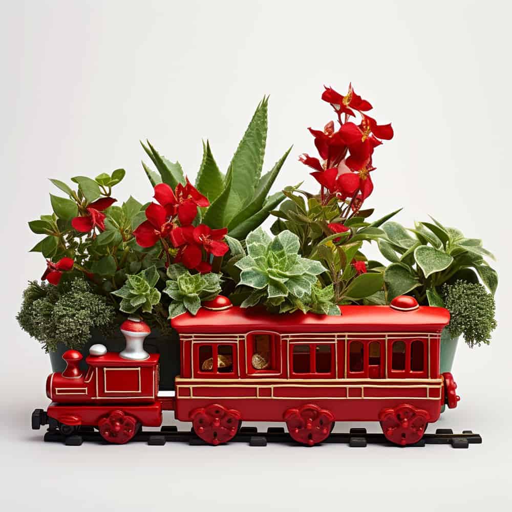 Small holiday train with lots of plant on a white background